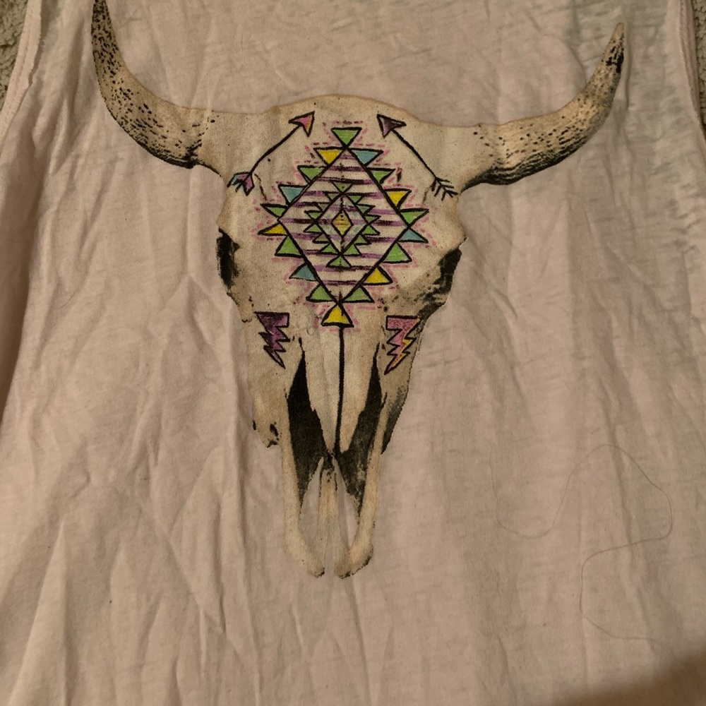 Love this tee. Just. a little big for me.